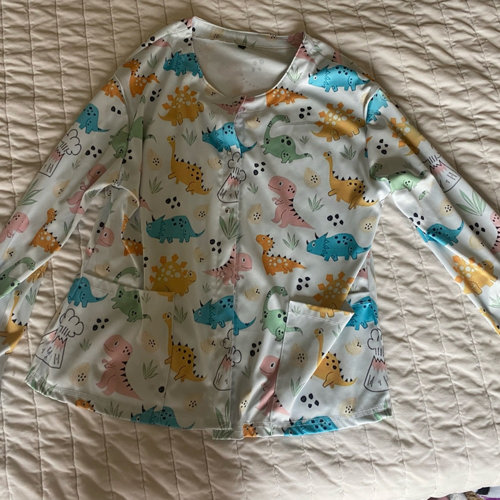 White printed dinosaur scrub top pediatric nurse scrubs